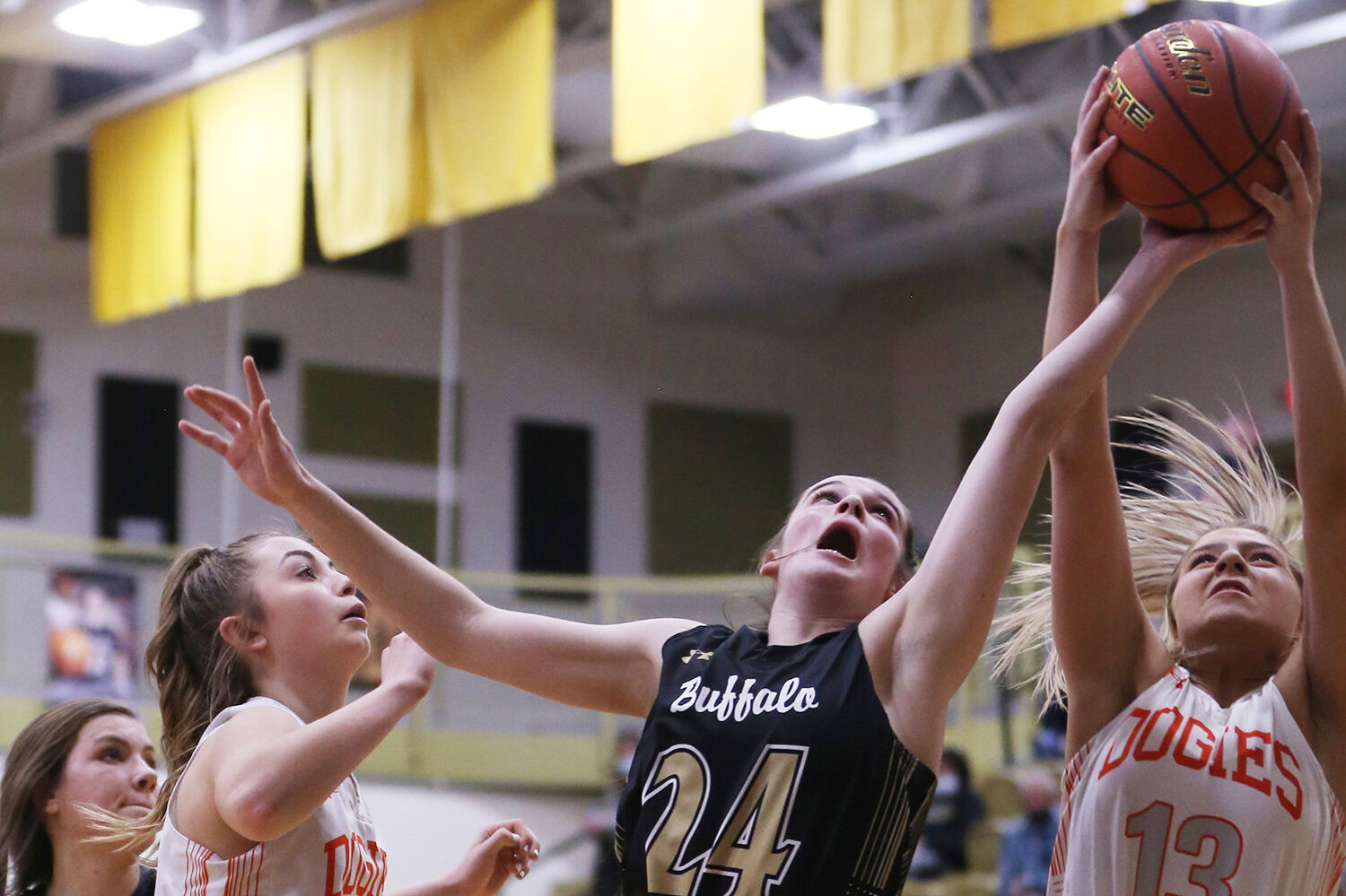 Cassidy Bessler stretches to steal a rebound